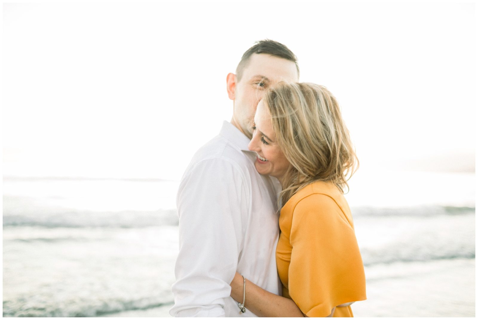 Couple laughing during engagement session in Los Angeles